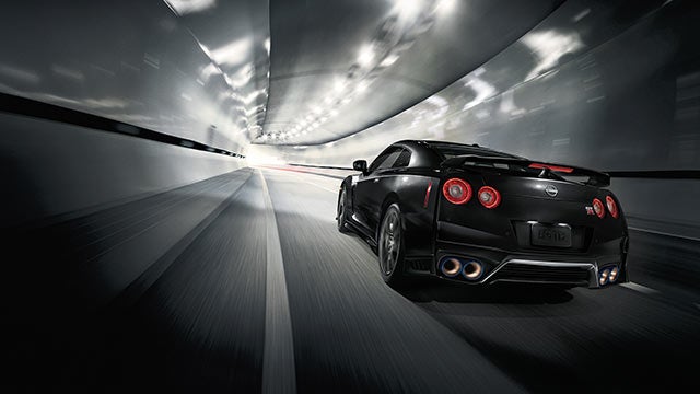 2023 Nissan GT-R seen from behind driving through a tunnel | Mitchell Nissan in Enterprise AL